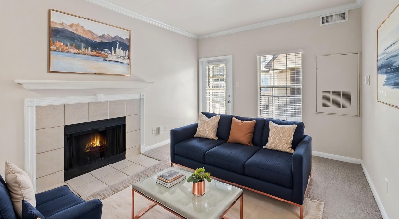 living room with couch coffee table and fireplace