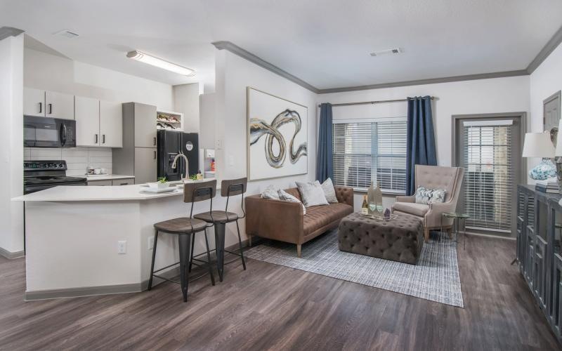 a living room with a wood floor